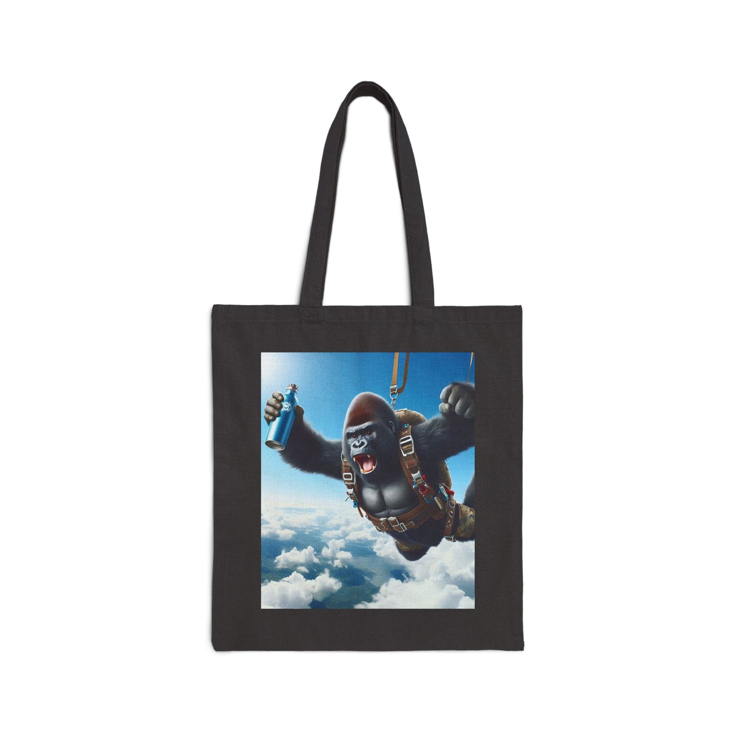 Our "Excited Gorilla Parachuting" Canvas Tote Bag features a thrilling gorilla parachuting through the sky, perfect for anyone who loves excitement and style. Ideal gift for skydiving, nature lovers, and anyone with a spirit of adventure. A tote for daily use, travel, and outdoor. BUY NOW! (SK Superb)