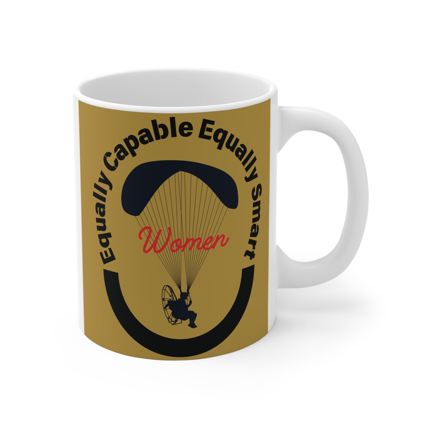 White ceramic mug with gold background featuring black silhouette of a woman paragliding and text 'Equally Capable Equally Smart Women'.