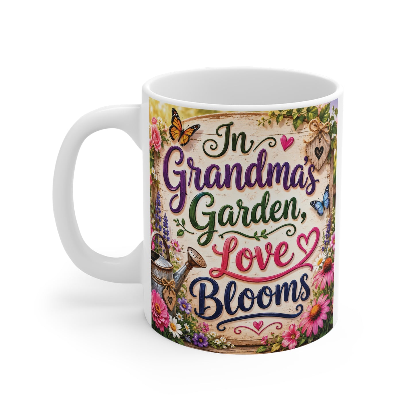 Ceramic Grandma mug decorated with flowers and butterflies displaying "In Grandma's Garden Love Blooms" message on a vintage-style background.