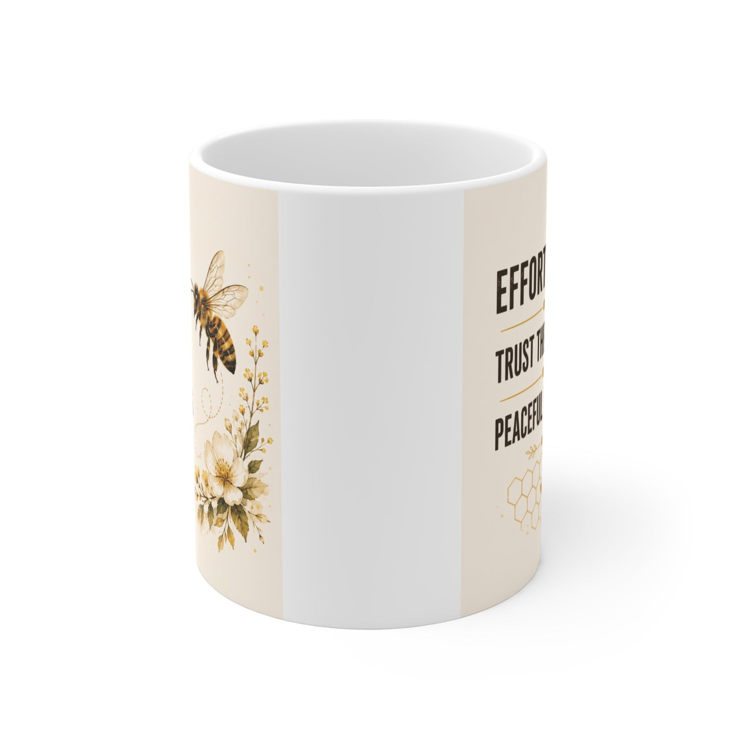 Motivational coffee mug displaying Effort First Trust the Journey Peaceful Progress quote alongside a bee illustration and elegant floral design.