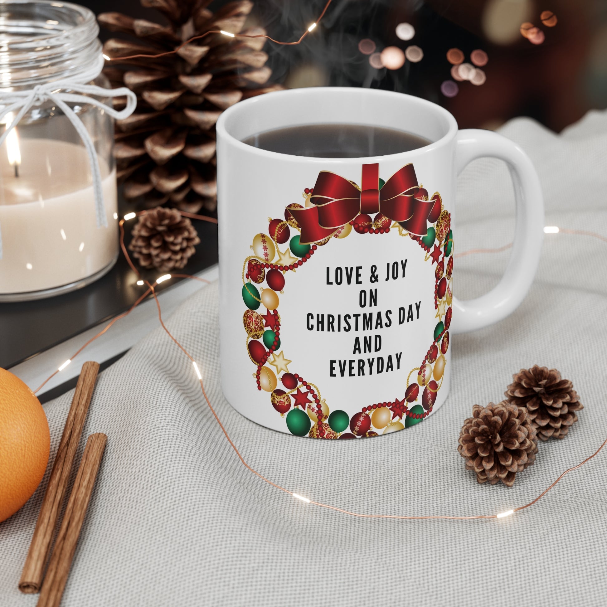 Spread holiday cheer with our 11oz Christmas mug featuring a festive wreath design and the heartfelt message: "Love & Joy on Christmas Day and Everyday." 