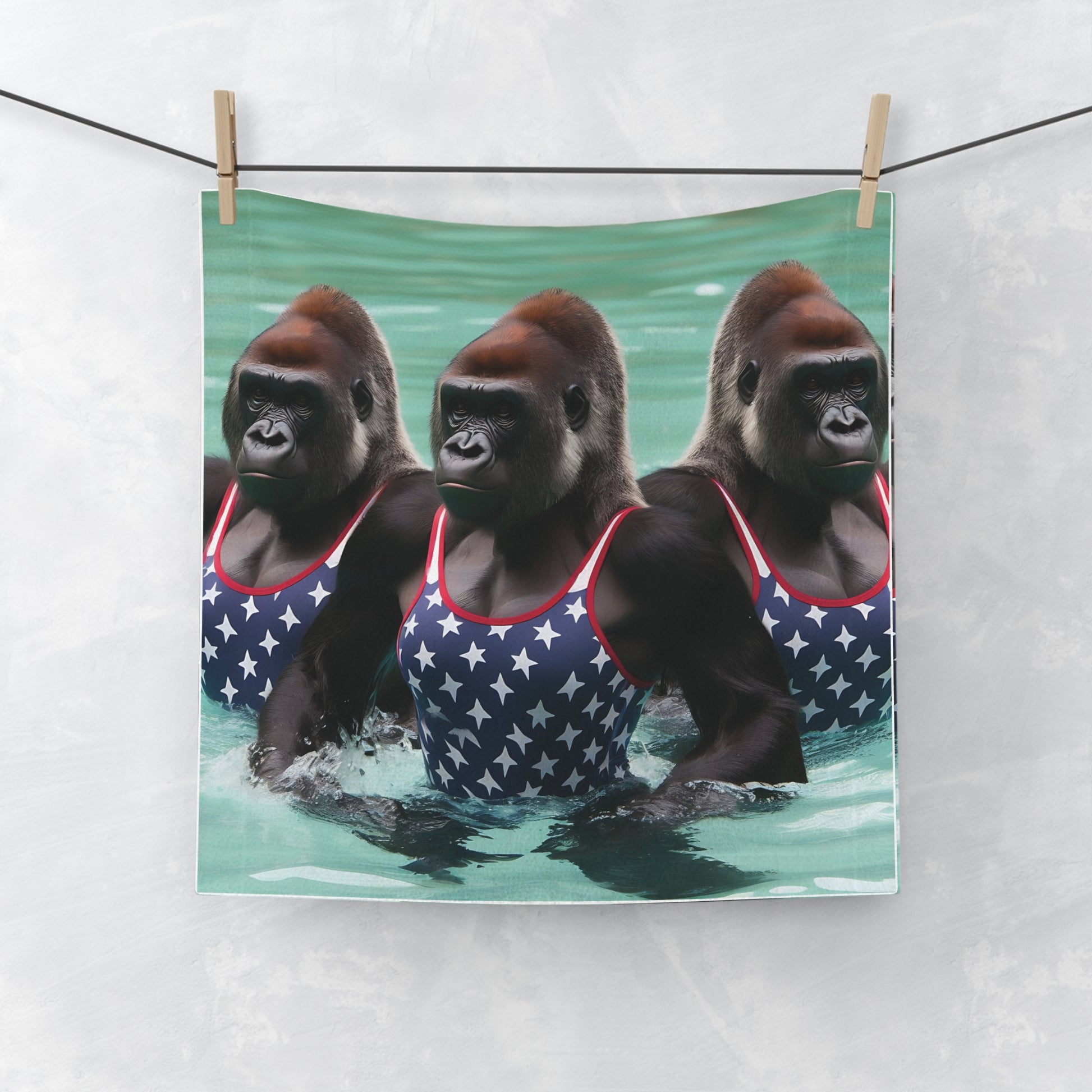 Dive into a splash of fun and patriotism with our "Patriotic Female Gorillas Swimmers Face Towel". Perfect for adding humor to your bathroom decor, this towel is also a great gift for friends and family, animal lovers and those who love quirky, whimsical designs. BUY NOW! (SK Superb)