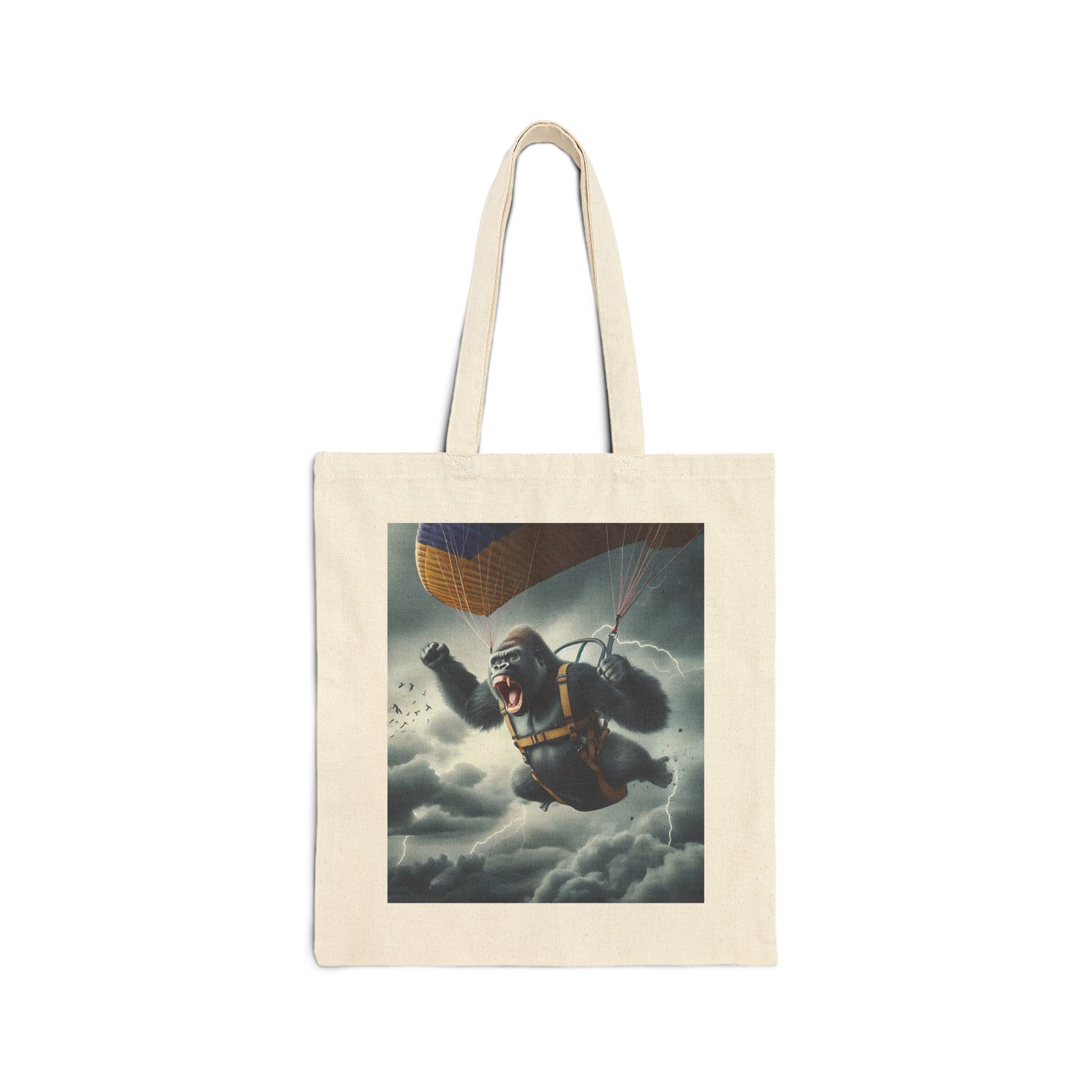 Unleash your adventurous spirit with our "Gorilla Skydive Adventure" Canvas Tote Bag. This eye-catching tote features a daring gorilla parachuting through a stormy sky. A fun, stylish and quirky design tote for daily use. Perfect as a gift for animal lovers, thrill-seekers. BUY NOW! (SK Superb)