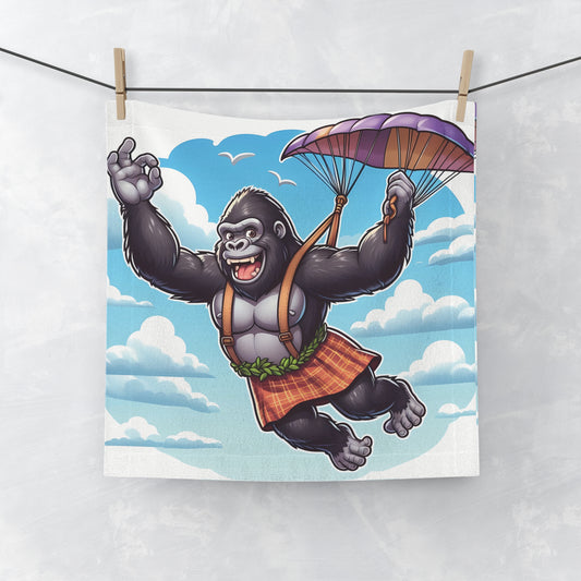 A vibrant design face towel of a cartoon-style gorilla parachuting, symbolizing the spirit of adventure. Ideal for use at home, gym, or on your next skydiving trip. Great Gift for skydivers, adventure lovers, and anyone who appreciates unique, fun designs. BUY NOW! (SK Superb)