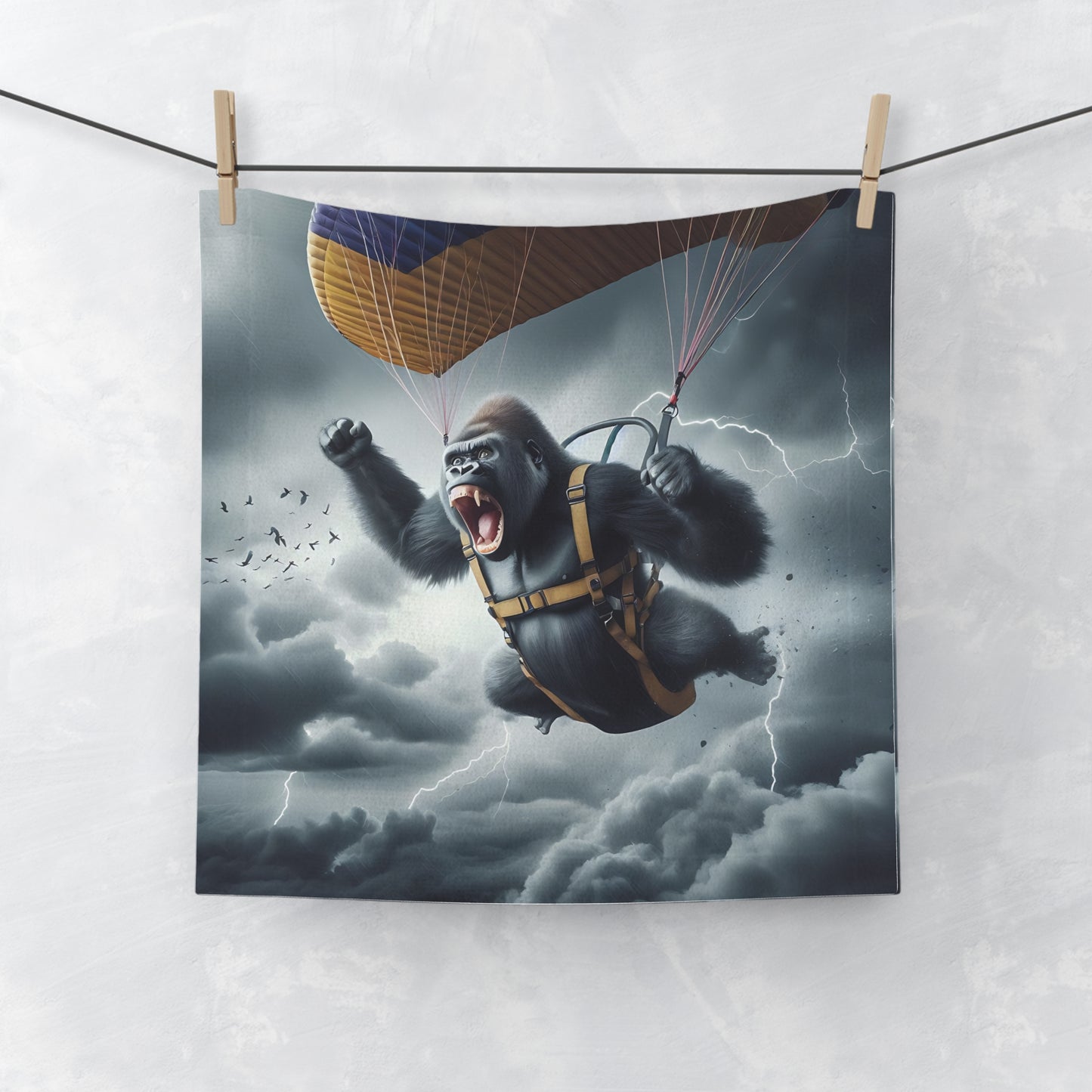 Elevate your bathroom or gym decor with our "Exciting Gorilla Parachuting in Stormy Weather Face Towel". This towel features a gorilla filled with excitement mid-parachute descent against a dramatic stormy sky. Perfect for adventure enthusiasts and wildlife lovers alike. BUY NOW! (SK Superb)