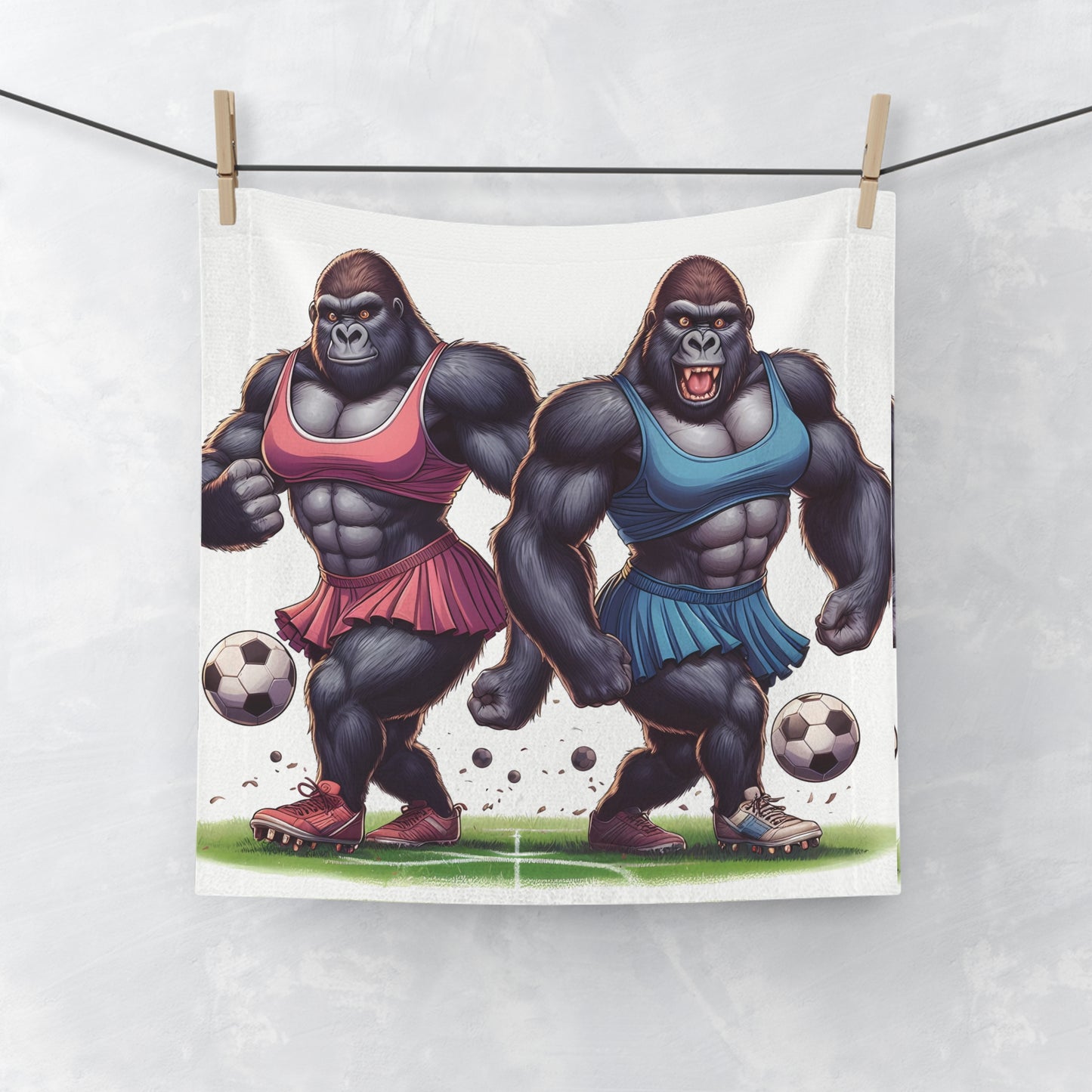 Our "Gorilla Football Face Towel" features a playful and unique design of two muscular female gorillas dressed as football players. A face towel of humor. A perfect gift for sports enthusiasts and those who love quirky designs. BUY NOW! (SK Superb)