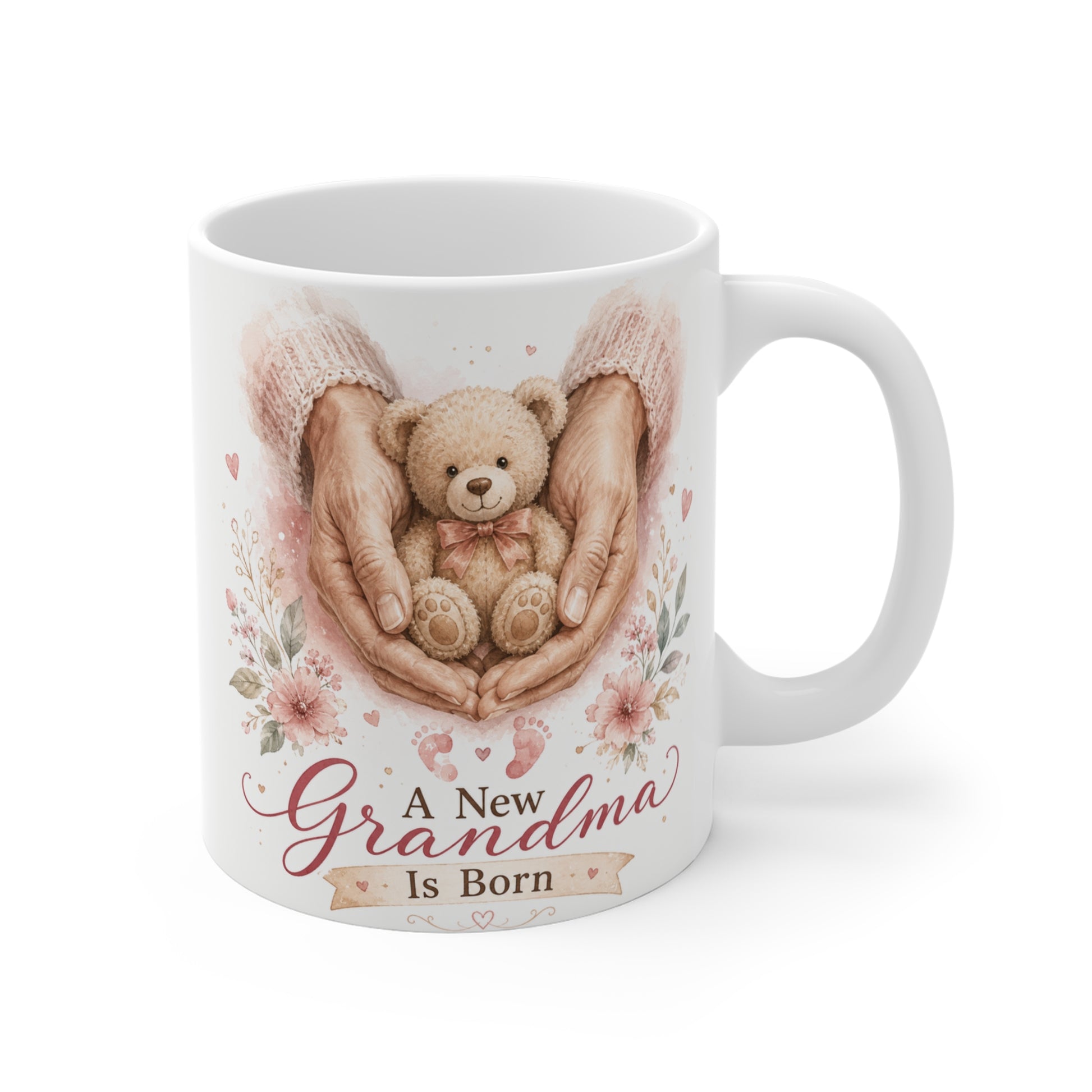 A New Grandma Is Born 11oz ceramic coffee mug with watercolor teddy bear and floral pregnancy announcement design.
