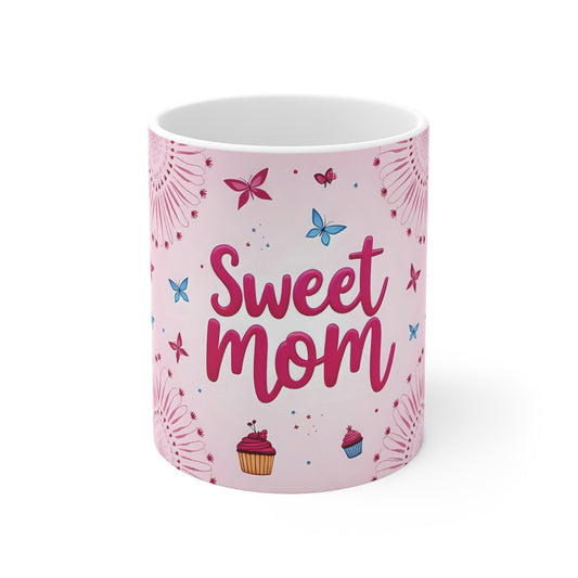 Sweet mom 11oz coffee mug with pink wrap around floral butterfly design and cupcake illustrations