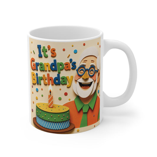 Colorful 11oz ceramic mug featuring “It’s Grandpa’s Birthday” text with smiling grandpa illustration and birthday cake design.
