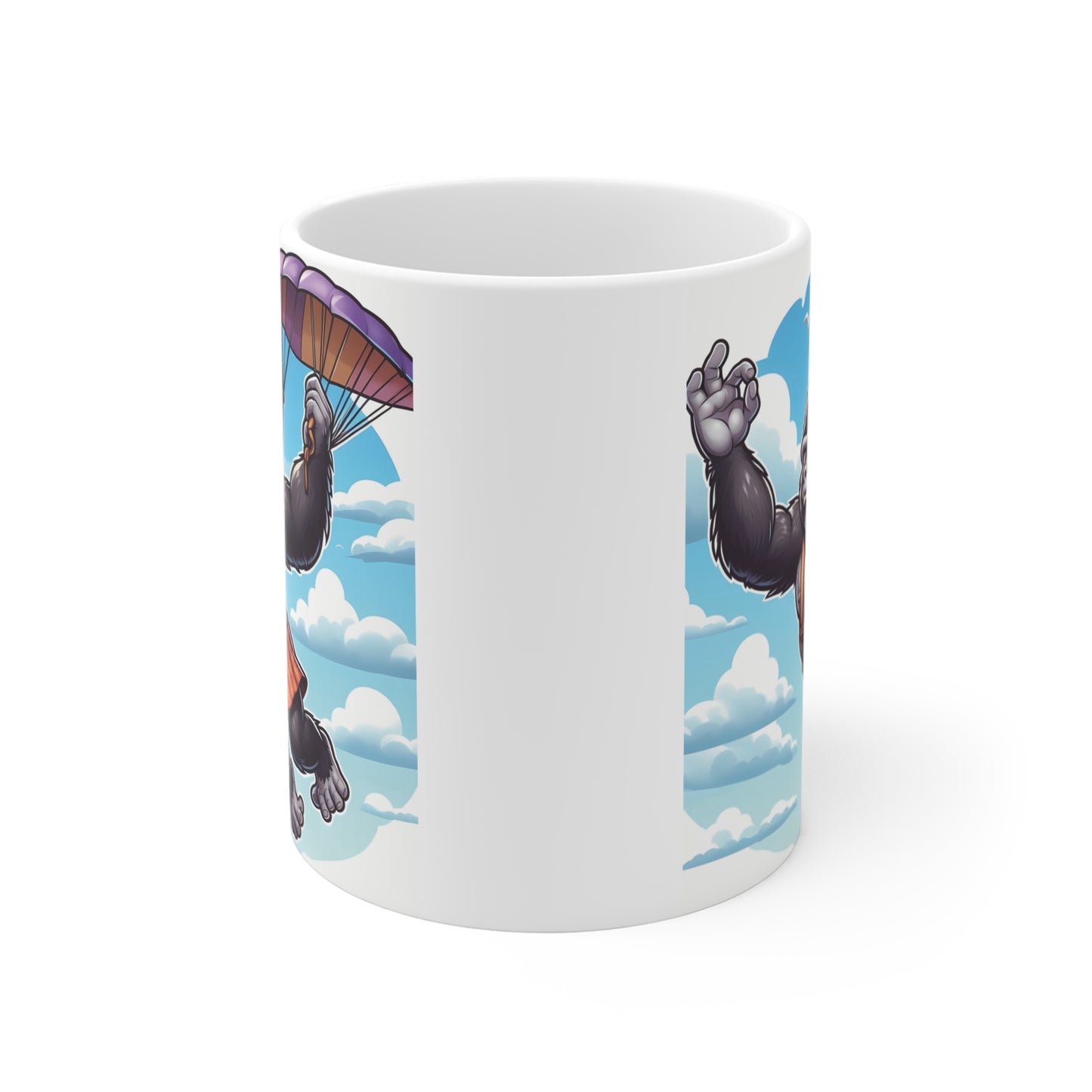 Cute cartoon gorilla skydiver coffee mug with parachute, clouds, and playful adventure artwork, perfect for animal lovers and novelty mug fans.