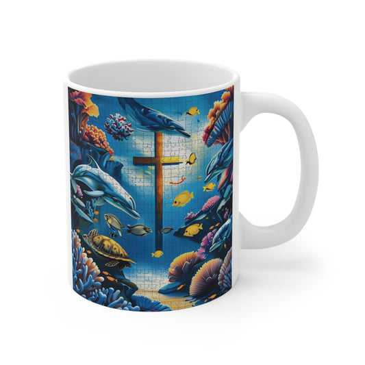 11oz Christian coffee mug with underwater ocean scene and glowing cross surrounded by colorful fish and coral reef artwork