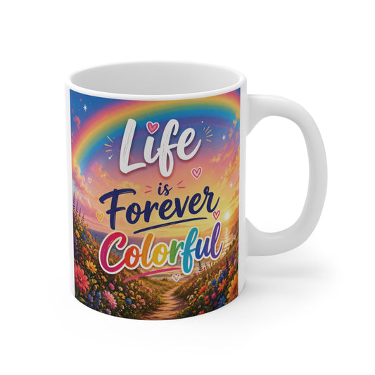 Colorful inspirational mug with rainbow and flowers featuring the quote “Life is Forever Colorful” in vibrant hand-lettered typography.