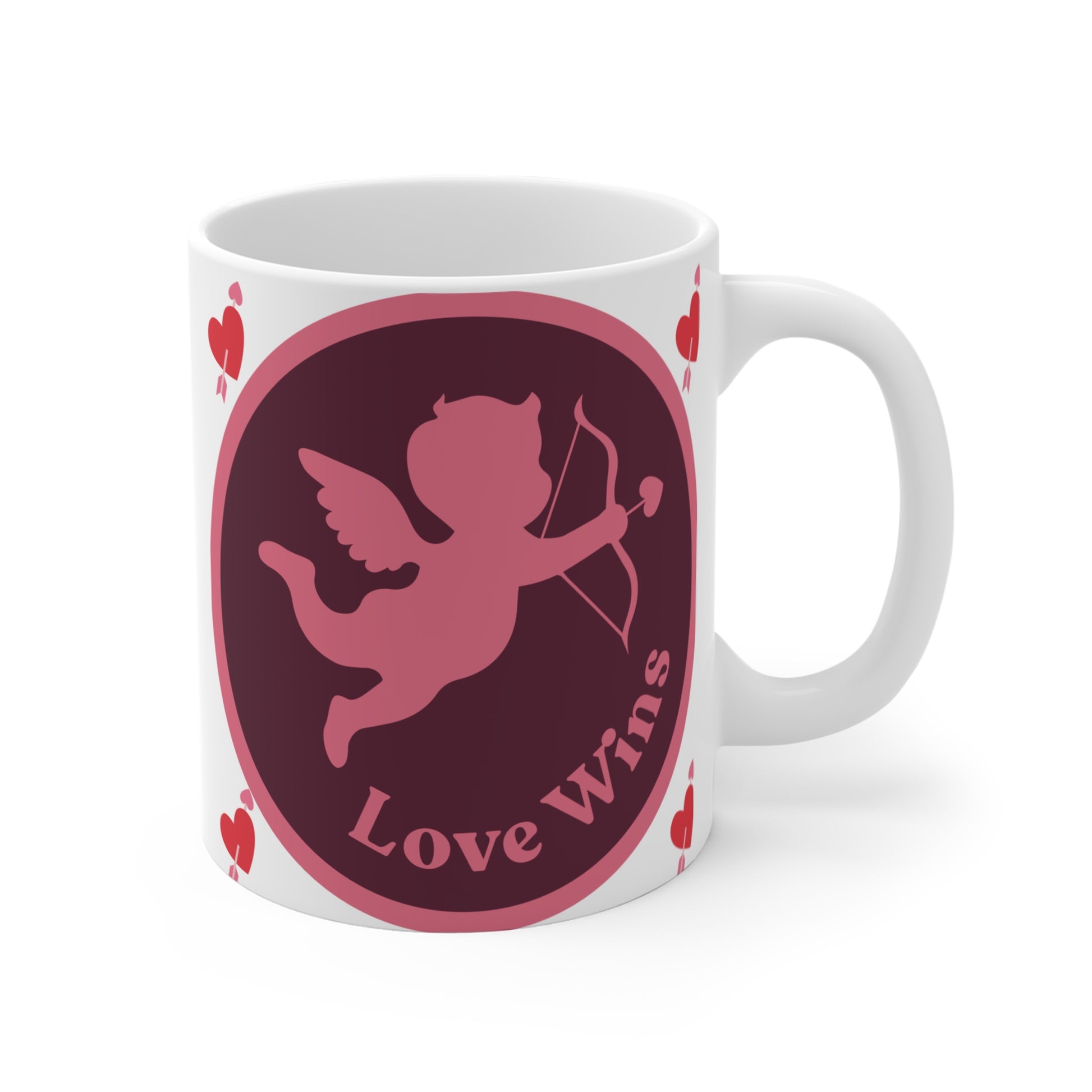 Valentine's Day coffee mug with flying cupid silhouette, heart decorations, and inspirational message 'Love Wins' on white background.