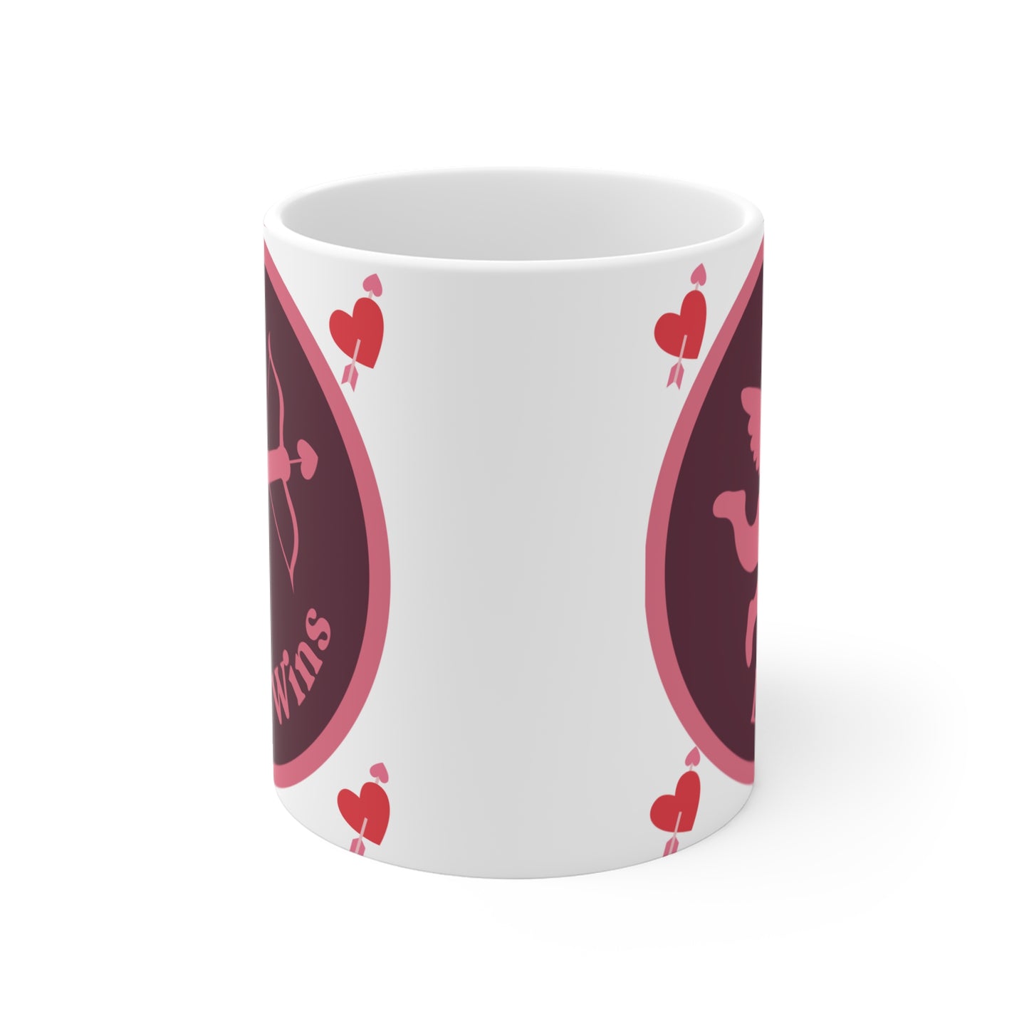 White ceramic mug featuring pink cupid holding a bow and arrow with heart, surrounded by red hearts, and text 'Love Wins'.