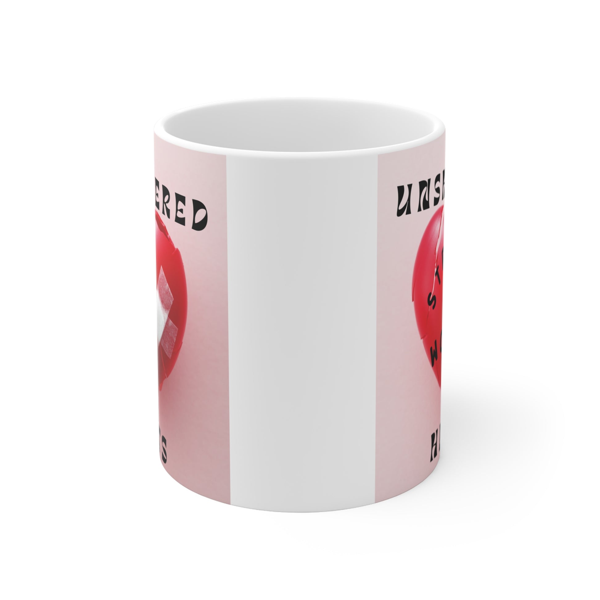 Inspirational women empowerment coffee mug with cracked heart illustration and ‘Unshattered Strong Women Hearts’ quote