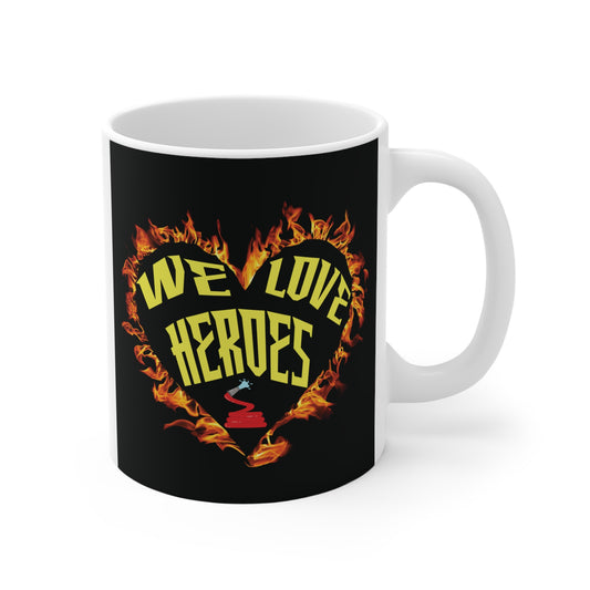 We love heroes firefighter mug with flaming heart design and fire hose symbol on black background