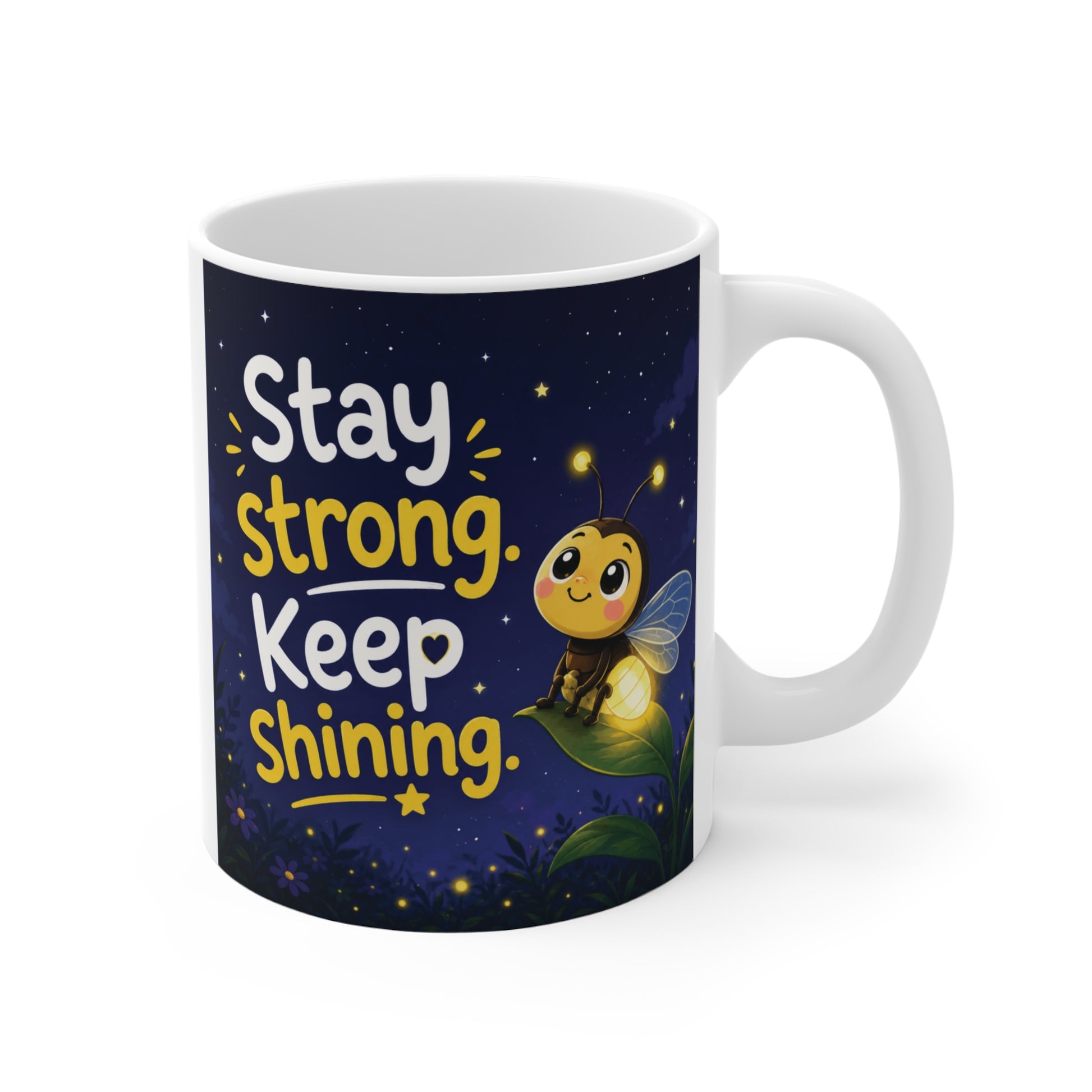 Inspirational 11oz ceramic mug with cute glowing firefly and Stay Strong Keep Shining quote on dark blue background