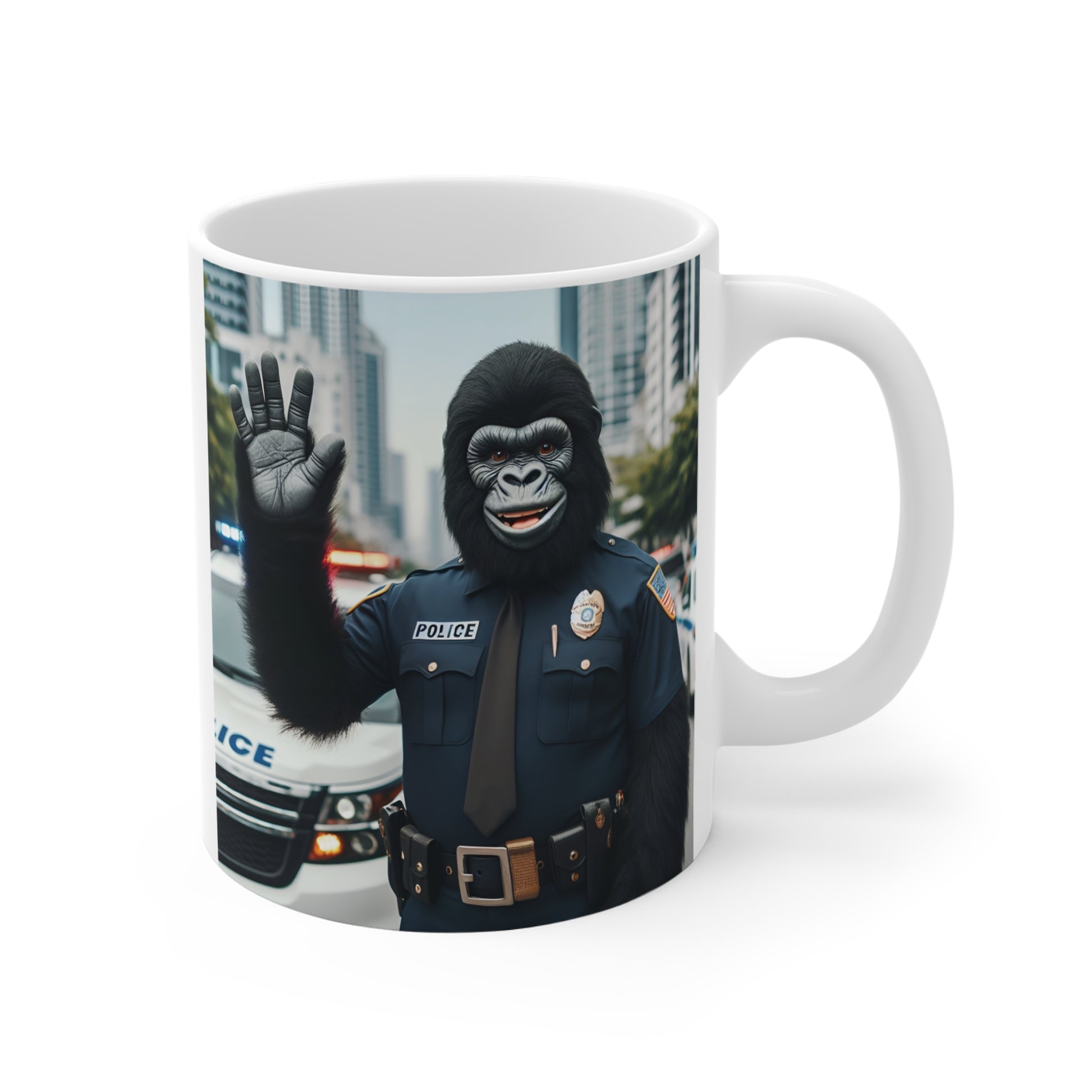 White ceramic mug featuring a smiling gorilla dressed as a police officer waving in a city street with police vehicles in the background.
