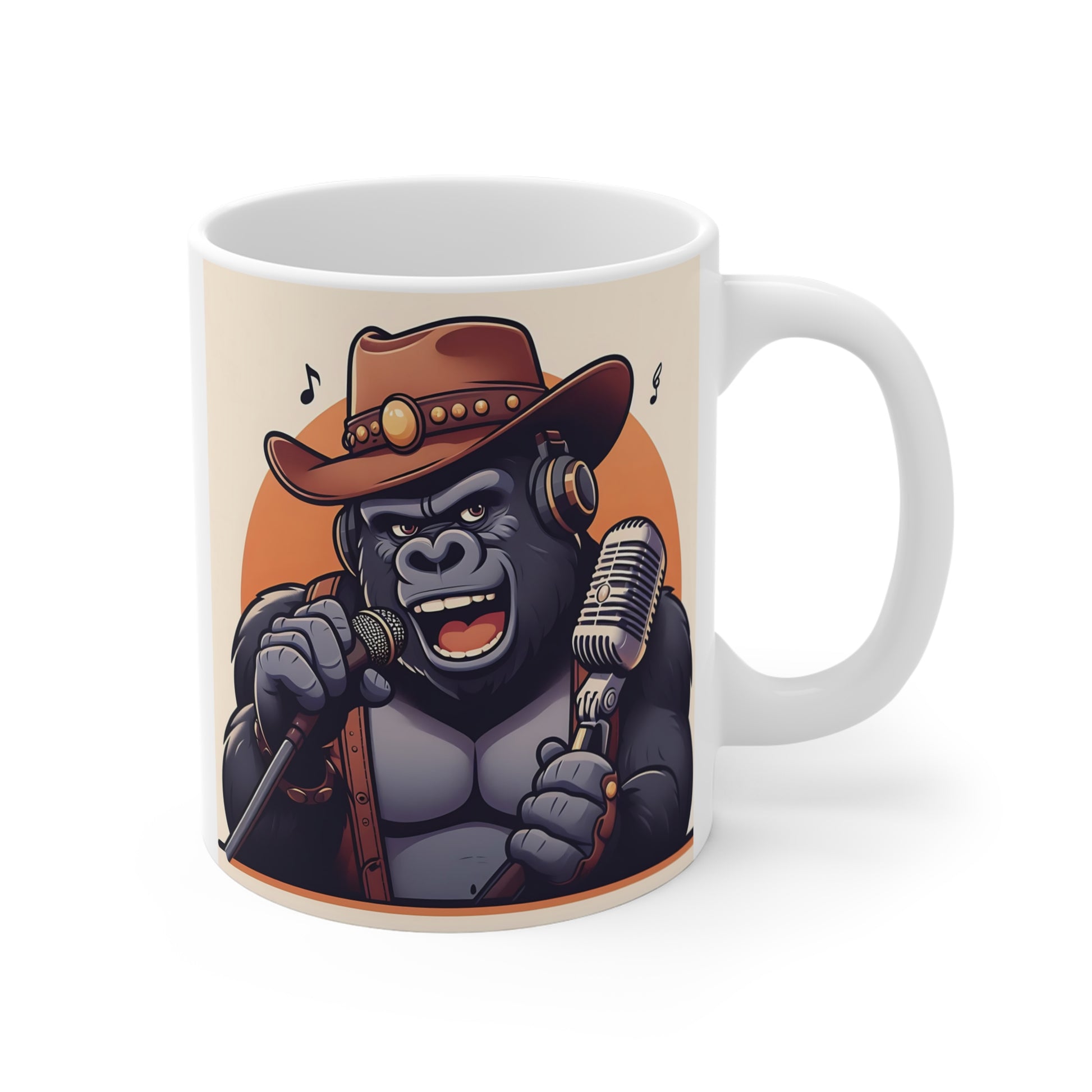 White ceramic mug featuring a cartoon gorilla singing into a vintage microphone while wearing a cowboy hat and headphones in a fun music-themed design.