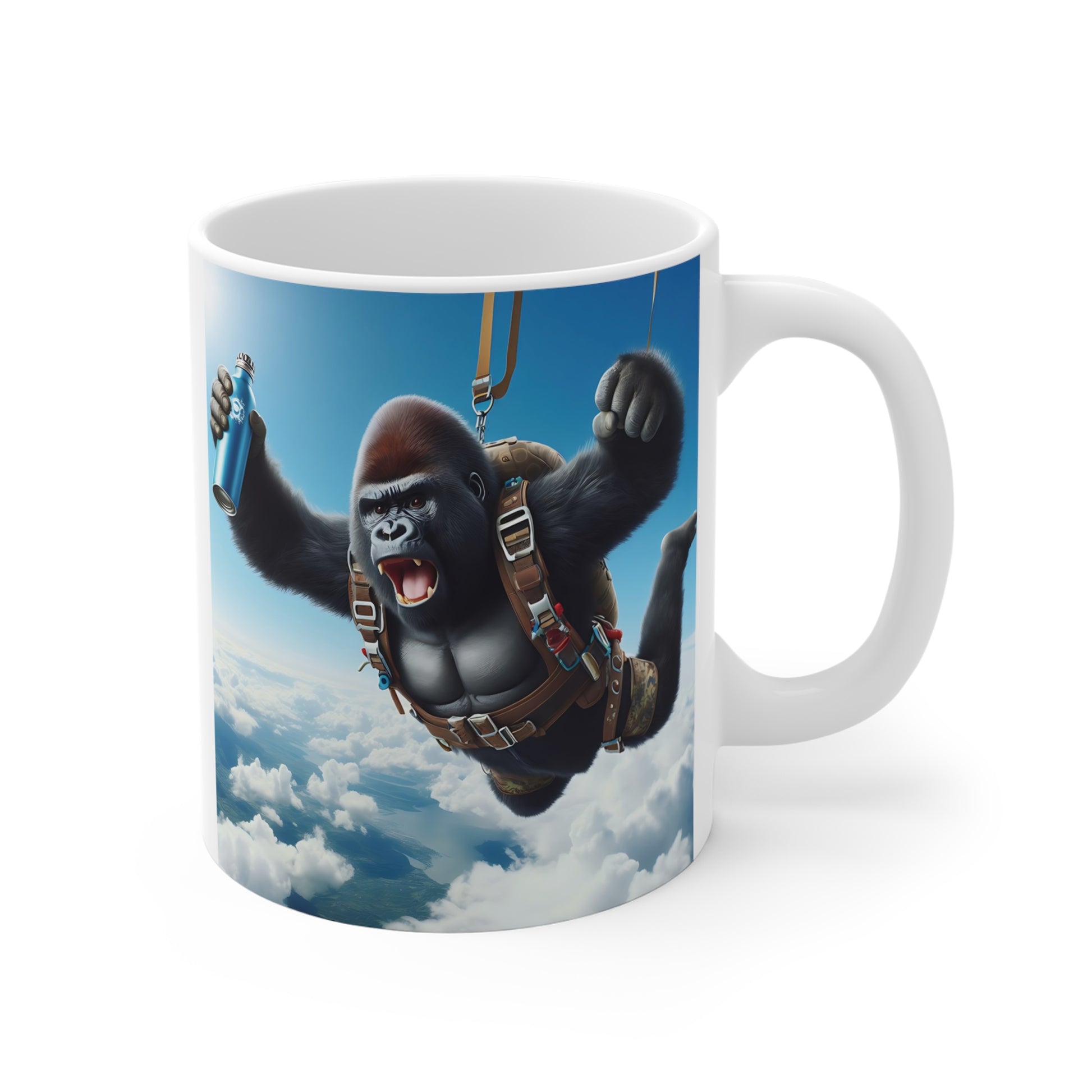 Funny skydiving gorilla coffee mug with parachute harness and energy drink, featuring adventurous animal artwork above the clouds.