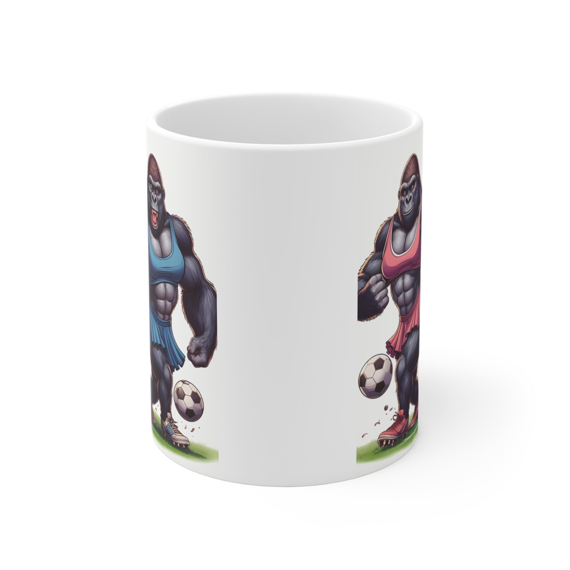 Gorilla athlete coffee mug with strong cartoon gorillas wearing pink and blue sports outfits on a soccer field, humorous sports fan gift mug.