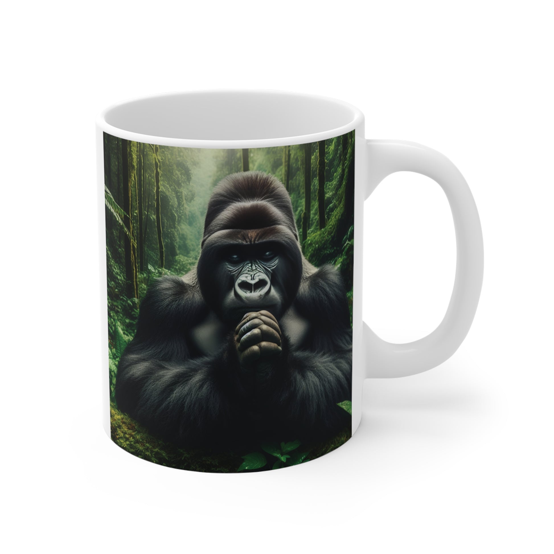 Realistic silverback gorilla resting in a lush rainforest on a white ceramic coffee mug, wildlife-inspired animal art design.