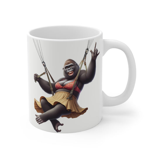 Funny gorilla parachuting mug featuring a happy ape in a skirt and parachute harness on a whimsical 11oz coffee mug