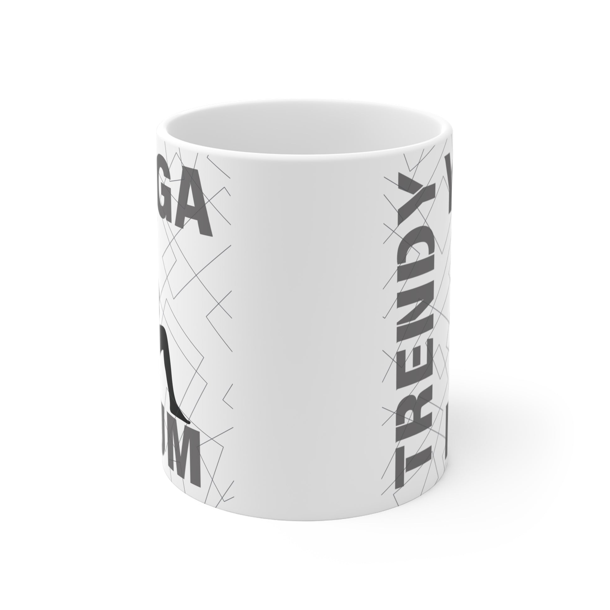 White coffee mug with "Trendy Yoga Mom" graphic and yoga pose silhouette.