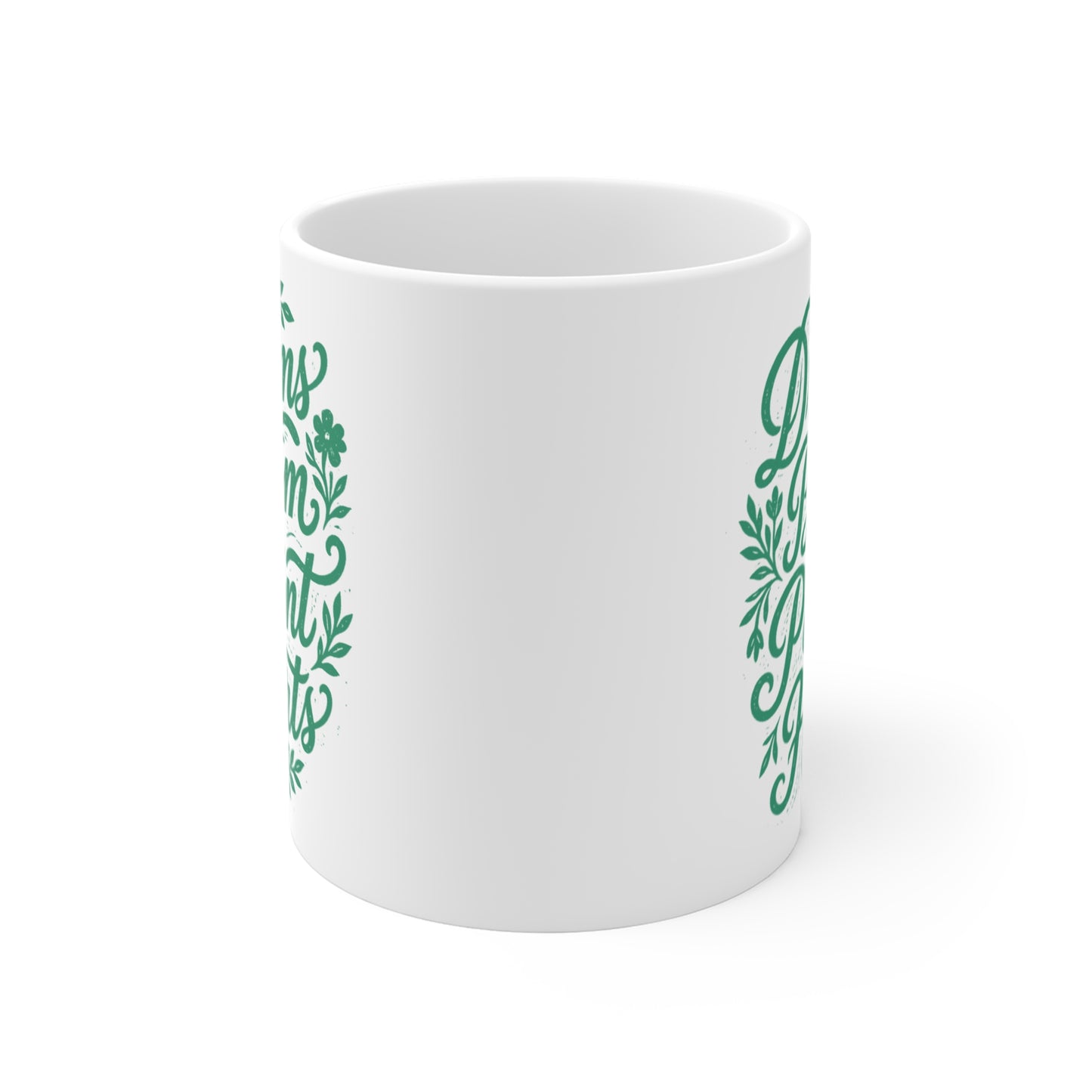White motivational coffee mug featuring Dreams Bloom in Patient Hearts quote with decorative leafy design