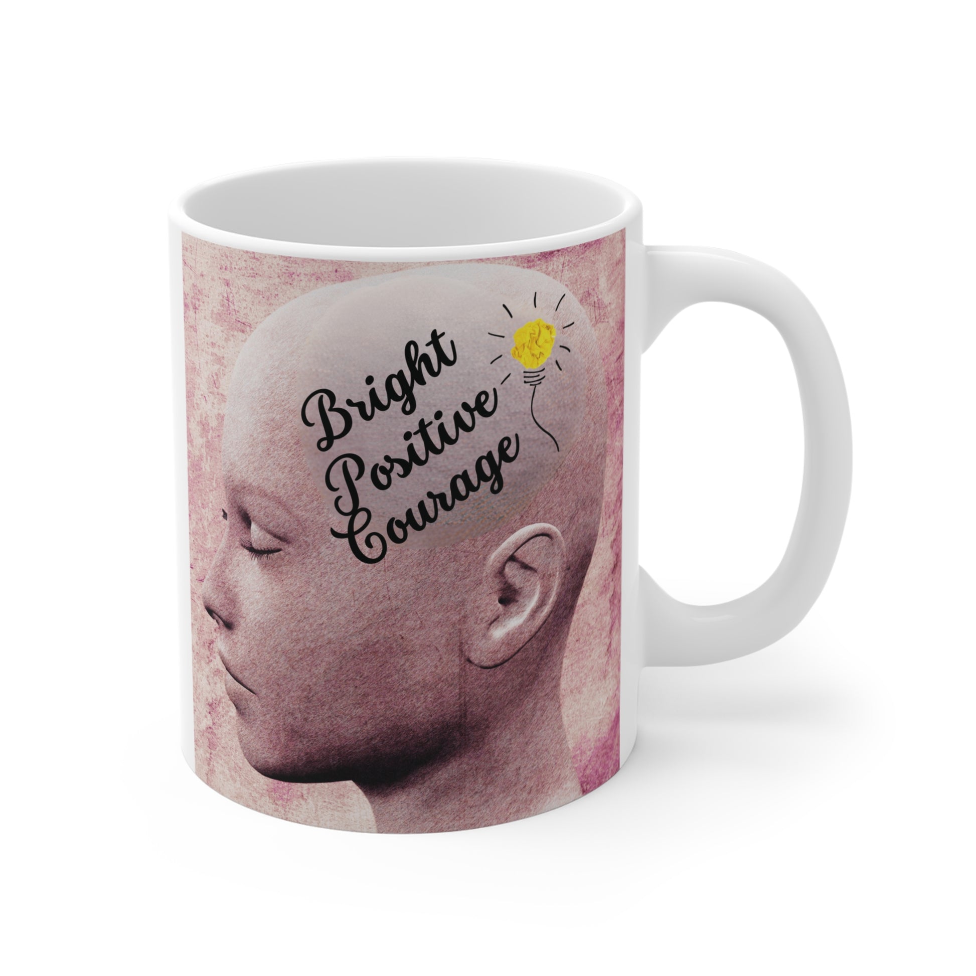 Motivational coffee mug showing side profile of a person with inspiring words 'Bright Positive Courage' and a glowing light bulb on pink textured background."