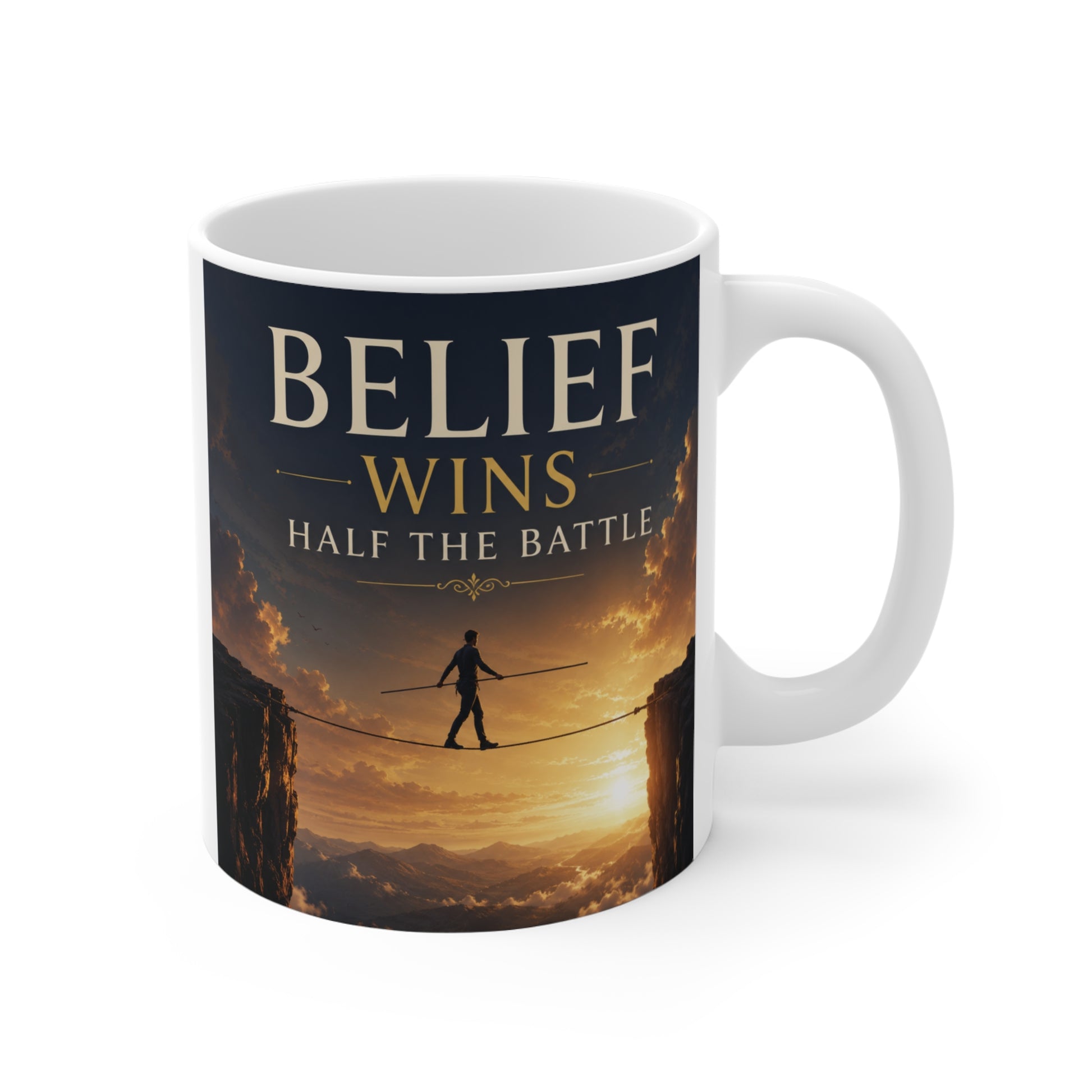 11oz motivational coffee mug featuring Belief Wins Half the Battle quote with a tightrope walker crossing a canyon at sunset