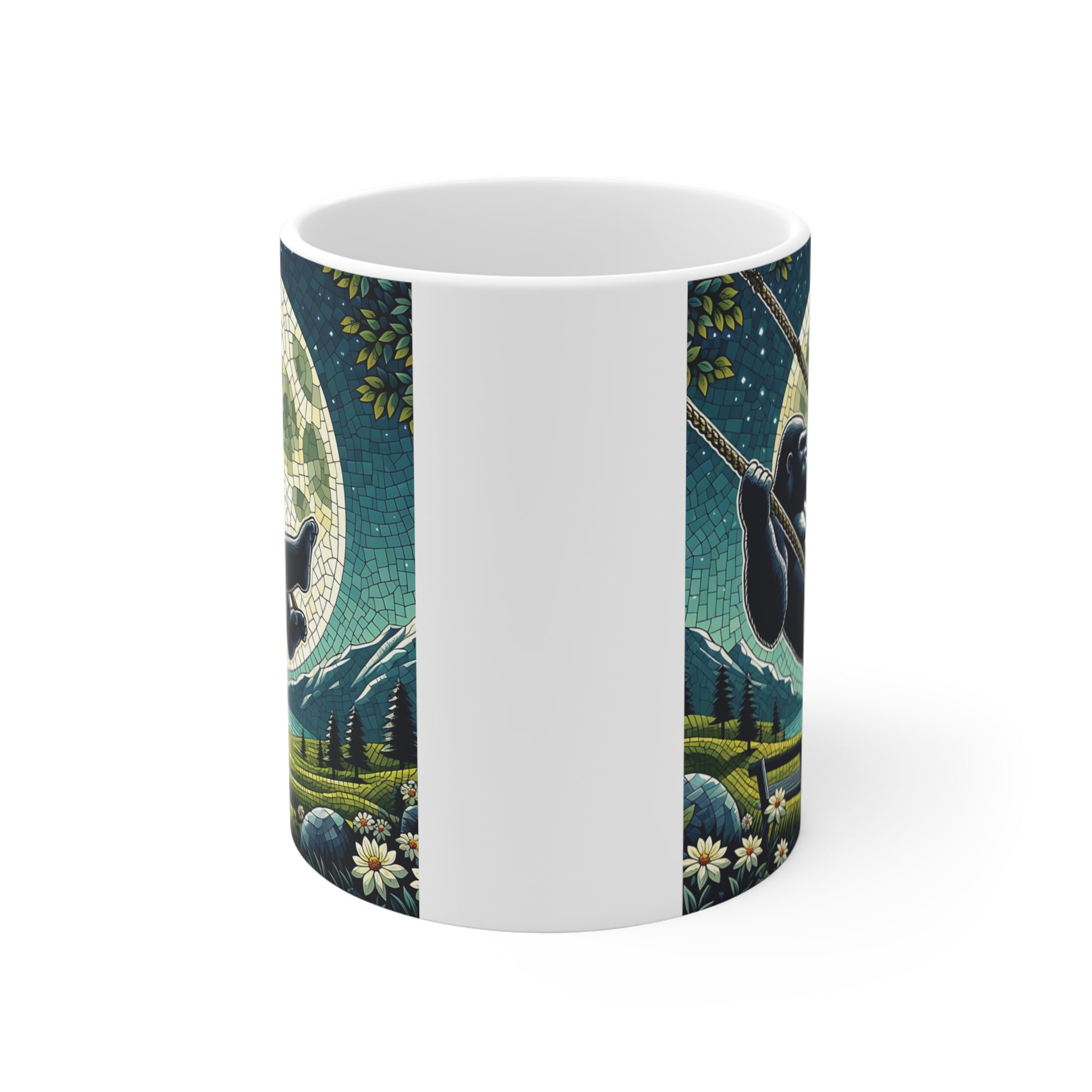 Artistic gorilla coffee mug with a moonlit night scene, mountain backdrop, flowers, and a gorilla swinging peacefully.