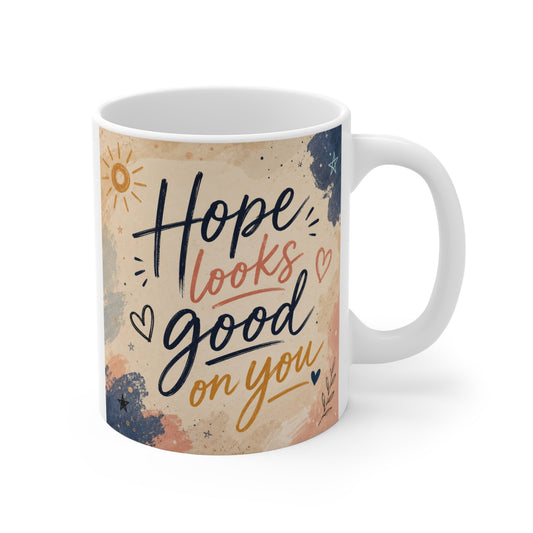 Inspirational 11oz ceramic mug with “Hope Looks Good On You” quote and watercolor design
