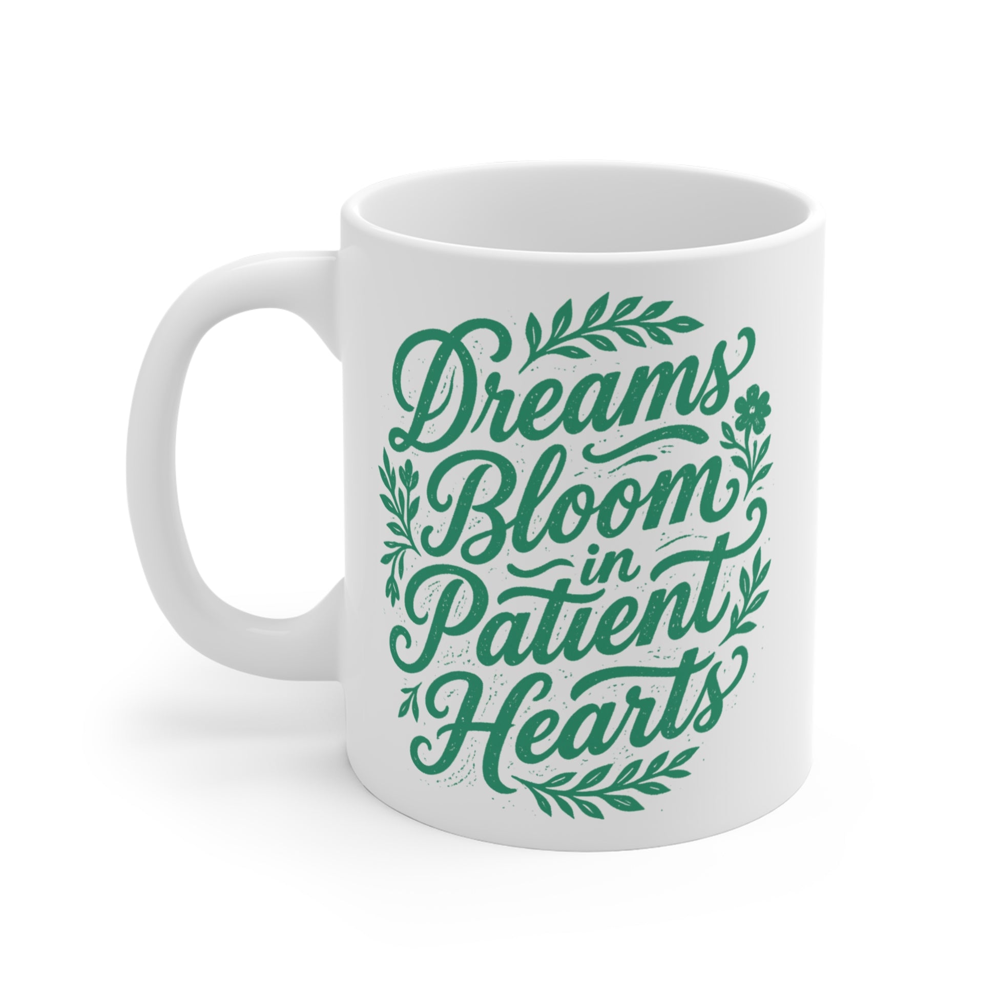 Inspirational ceramic tea cup with positive floral lettering design and Dreams Bloom in Patient Hearts message