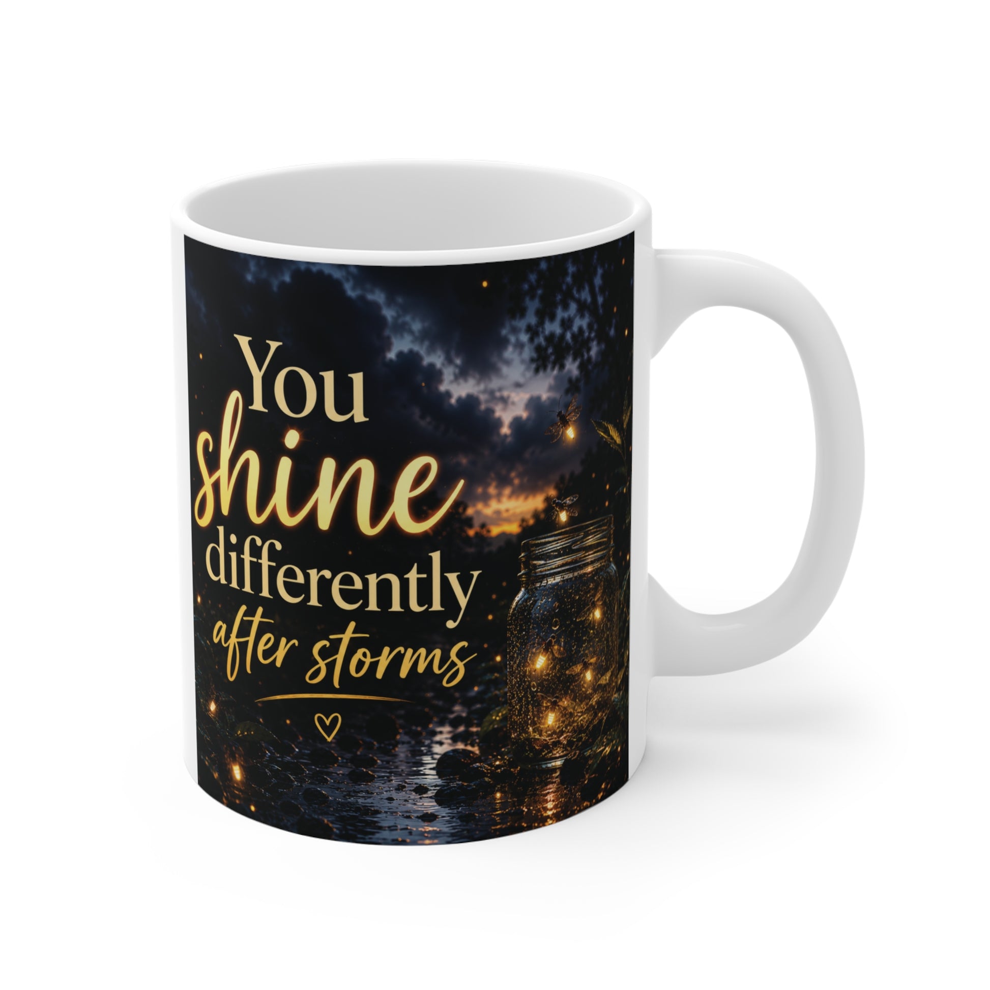 Inspirational 11oz mug with quote “You Shine Differently After Storms” and glowing night sky background