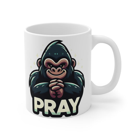 Cute praying gorilla mug with cartoon ape illustration and “PRAY” text on a motivational 11oz ceramic coffee mug