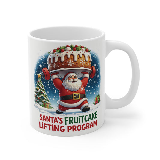 Santa’s Fruitcake Lifting Program 11oz Christmas mug featuring Santa lifting a fruitcake, funny holiday gift for gym lovers and weightlifters.