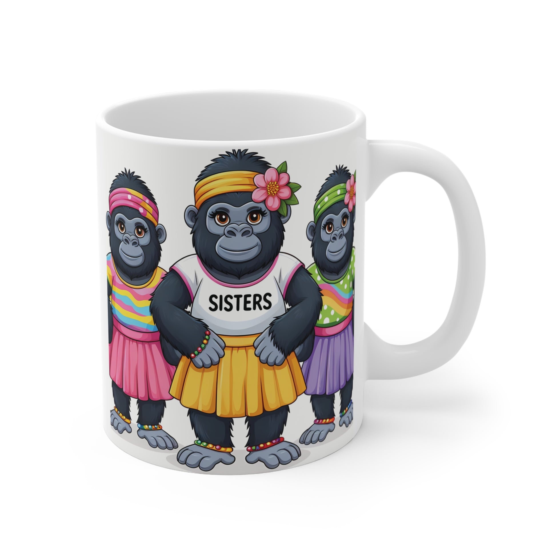 White ceramic mug featuring three adorable gorilla sisters wearing colorful skirts, flower headbands, and matching accessories with the word “SISTERS” on the center character's shirt.