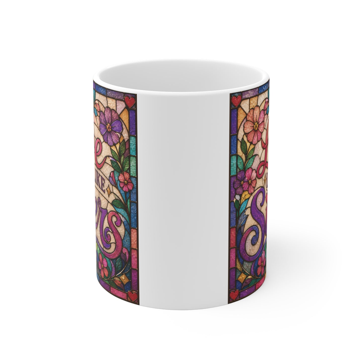 Colorful stained glass style sister coffee mug with floral artwork and the phrase "Love Looks Like Sisters," perfect as a birthday or Christmas gift for sisters.
