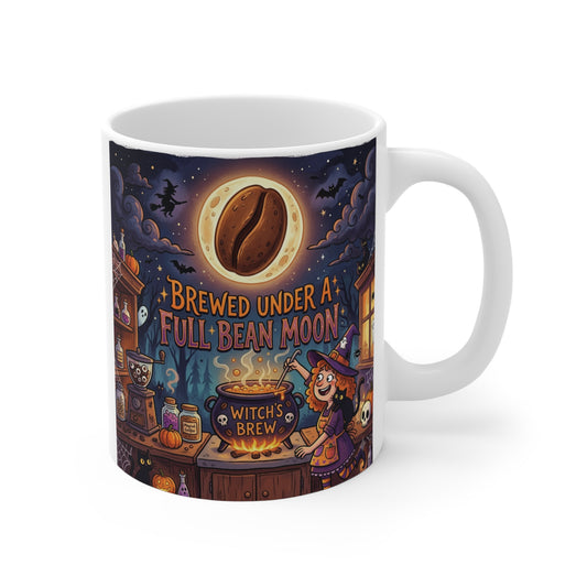11oz ceramic coffee mug featuring the phrase "Brewed Under a Full Bean Moon" with a whimsical witch brewing coffee beneath a glowing coffee bean moon in a cozy Halloween village.